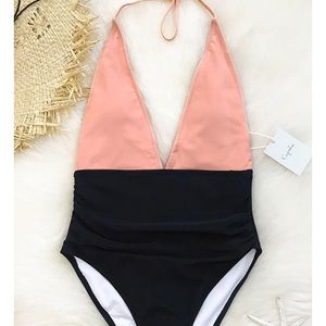 Brand new one piece swimsuit! Coral/black. Size L